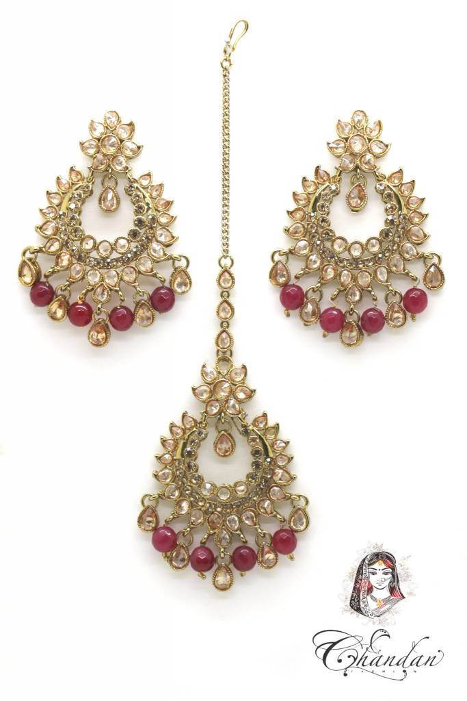 Golden Earings and Tikka with Maroon pearls and stones