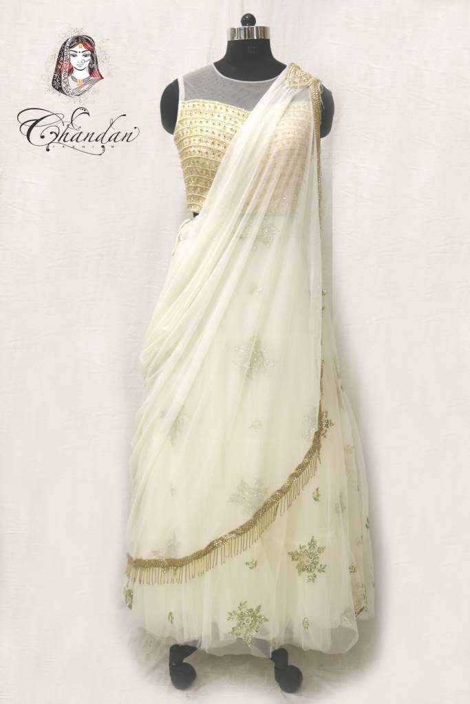 Cream lehenga choli with embroidery and sippy work